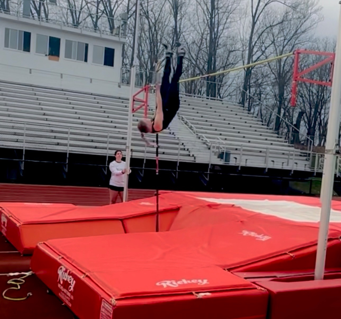 MVCC athlete performs the pole-vault.